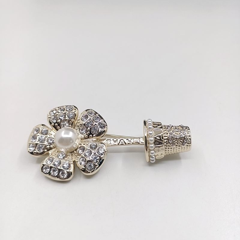 Ch*el brooches
